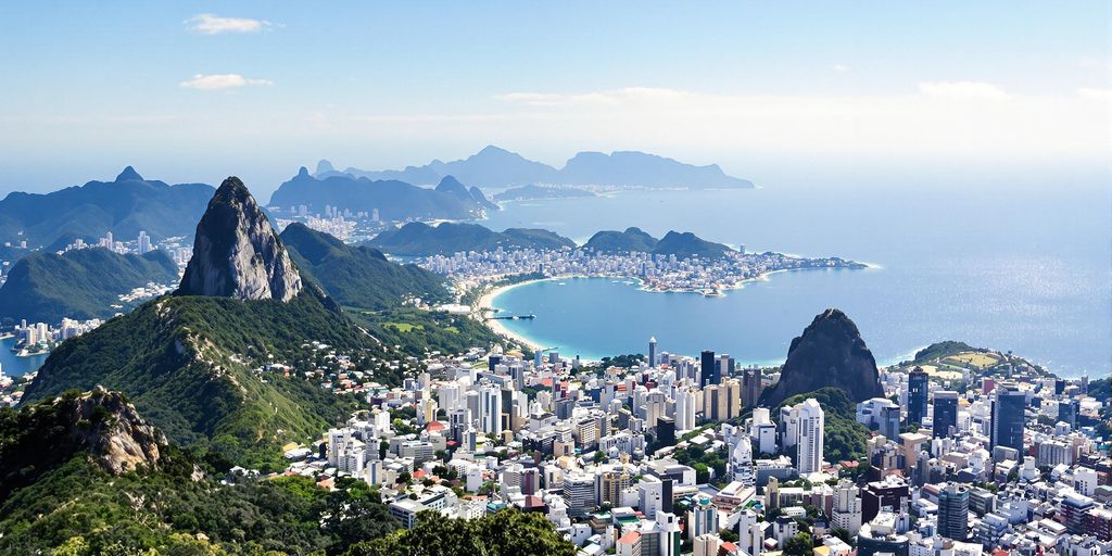 Aerial view of Rio de Janeiro's landmarks and coastline.