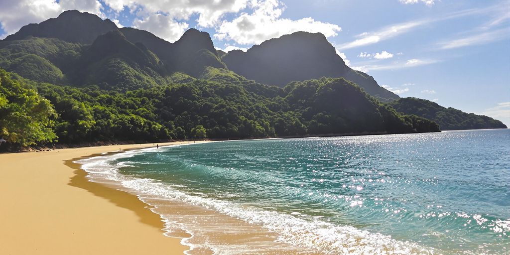 Lopes Mendes Beach with clear waters and golden sands.