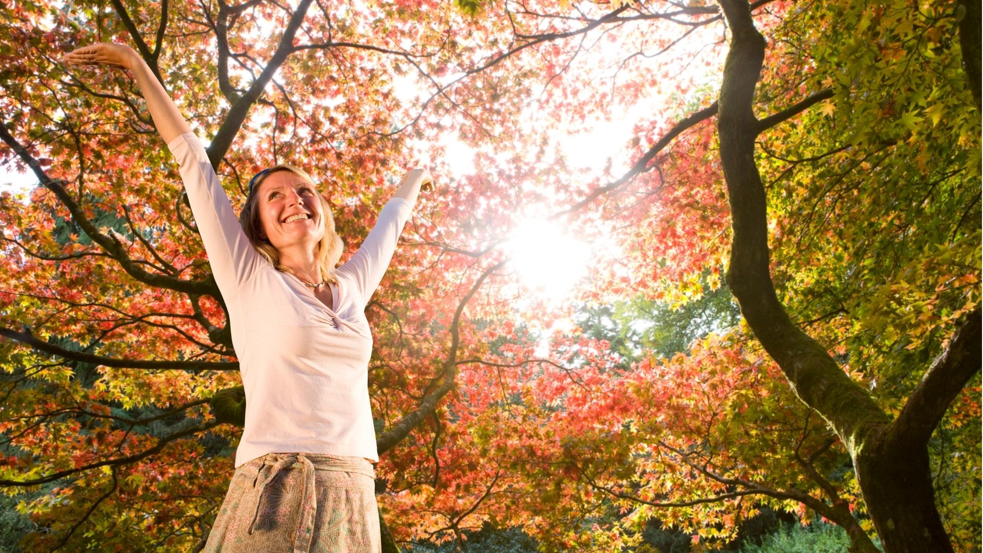 Woman enjoying autumn outdoors