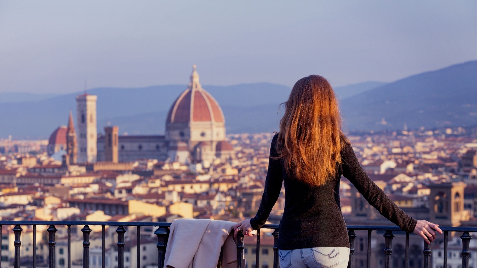 Woman overlooking Florence skyline