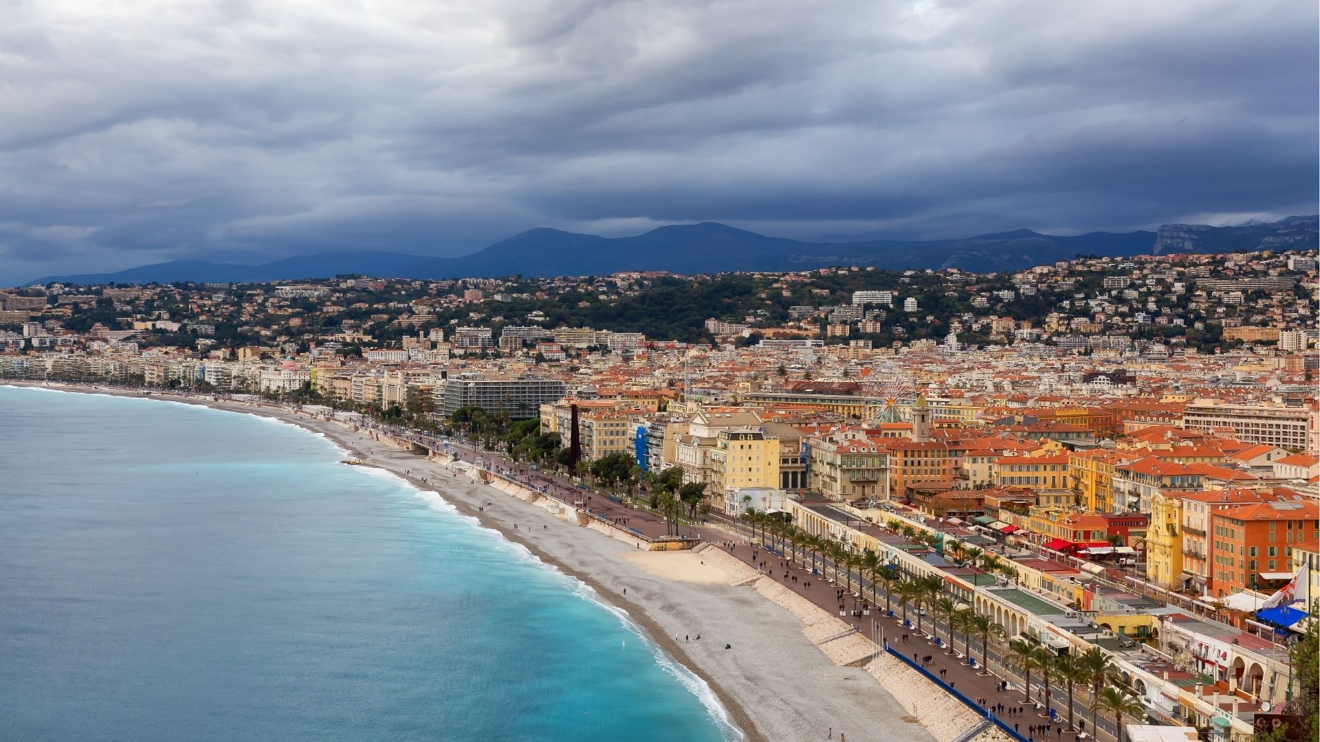 Sandy Beach by Historic City of Nice, France. Castle Hill
