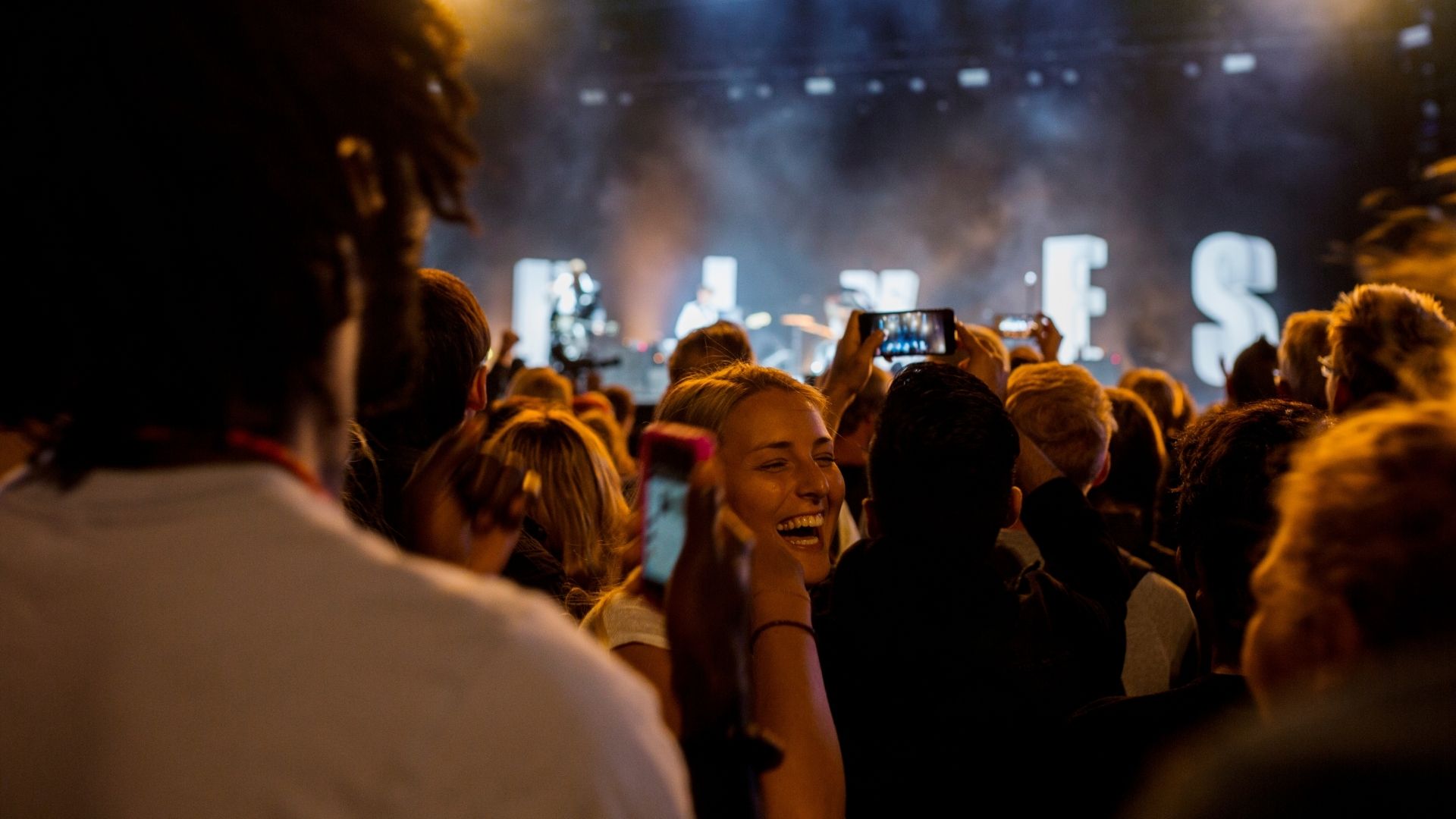 Friends having fun at music concert