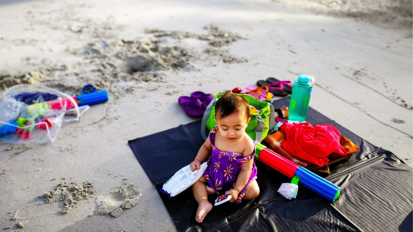 Baby playing on the beach