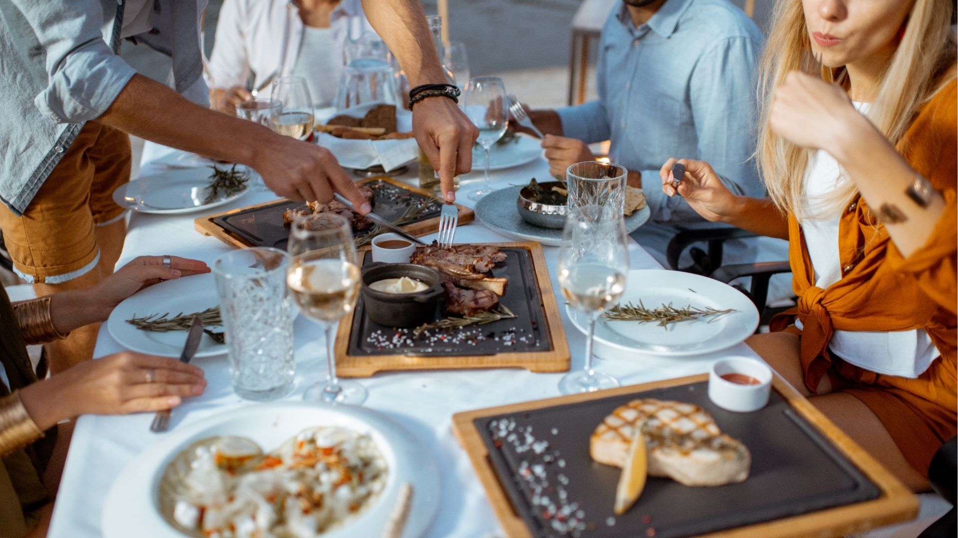 Festive dinner with delicious meals on the beach

