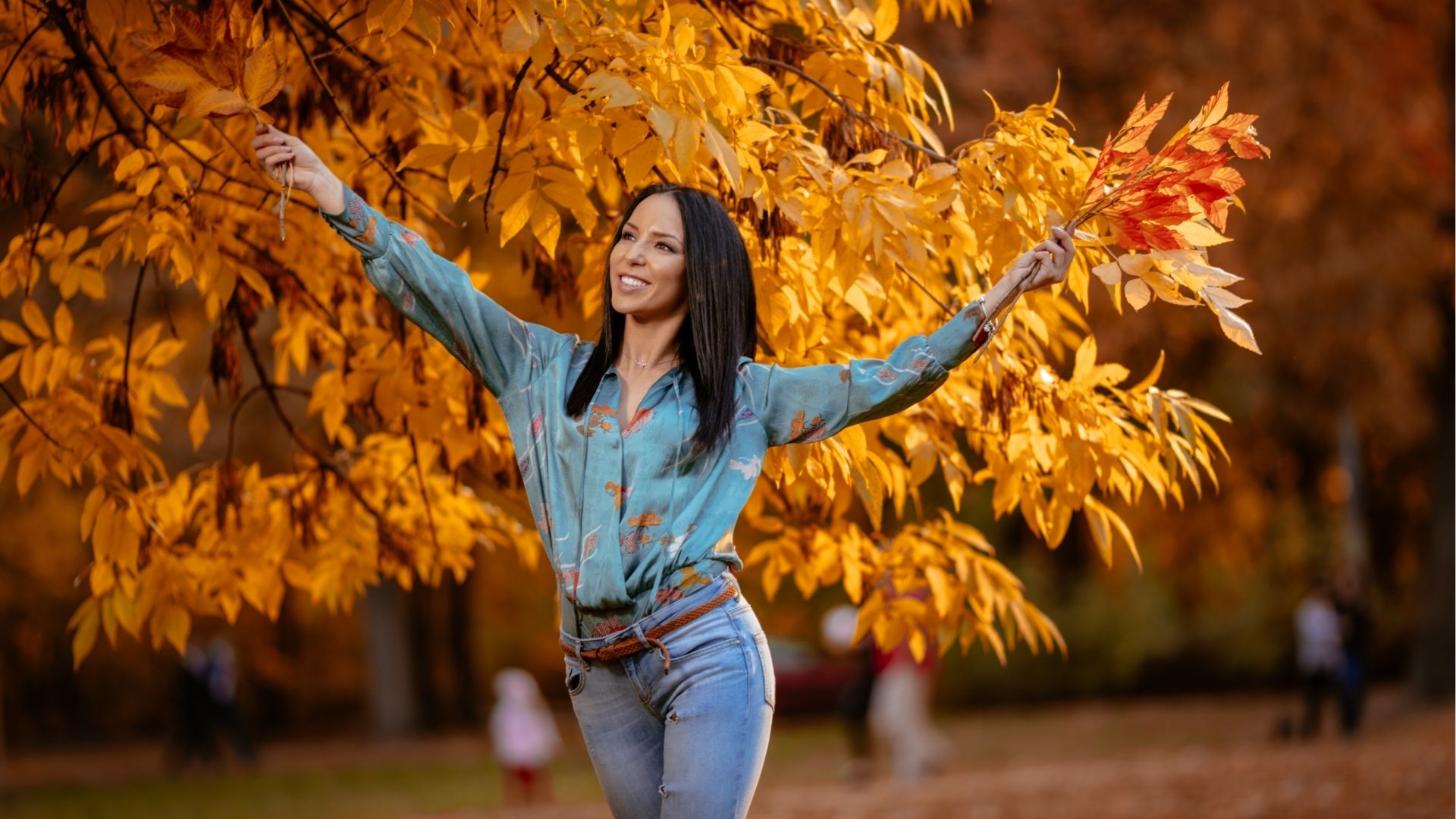 Happy Woman In Autumn Park