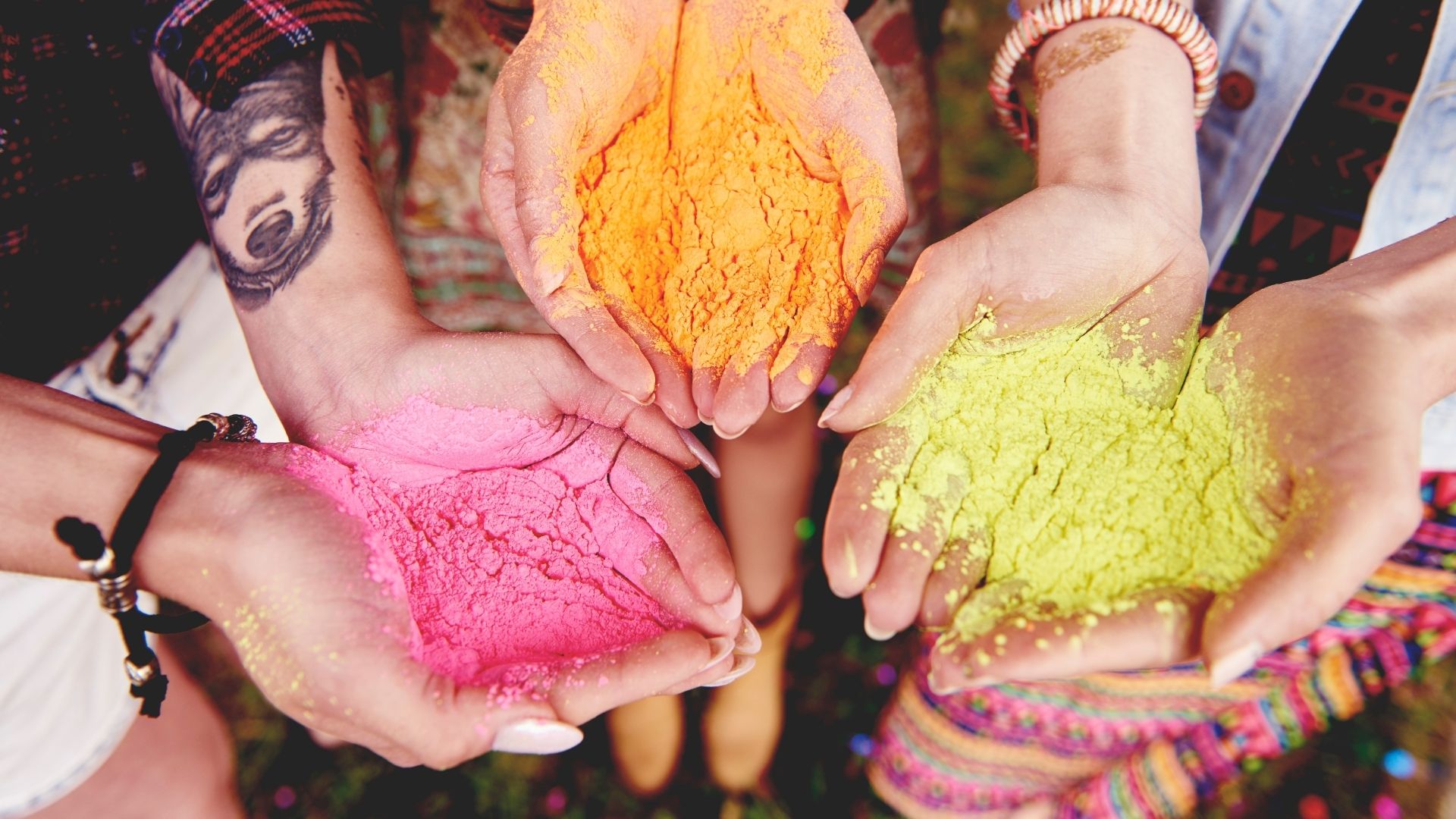 Holi colors in hand of women