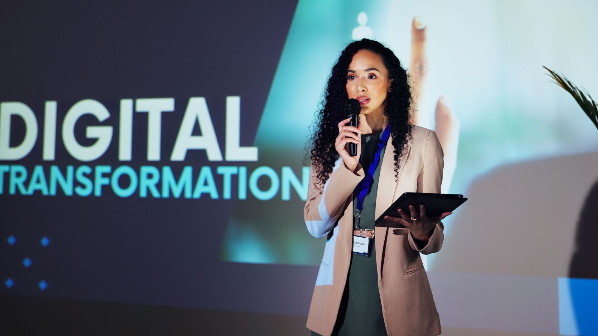 Woman leading a seminar with a digital transformation presentation