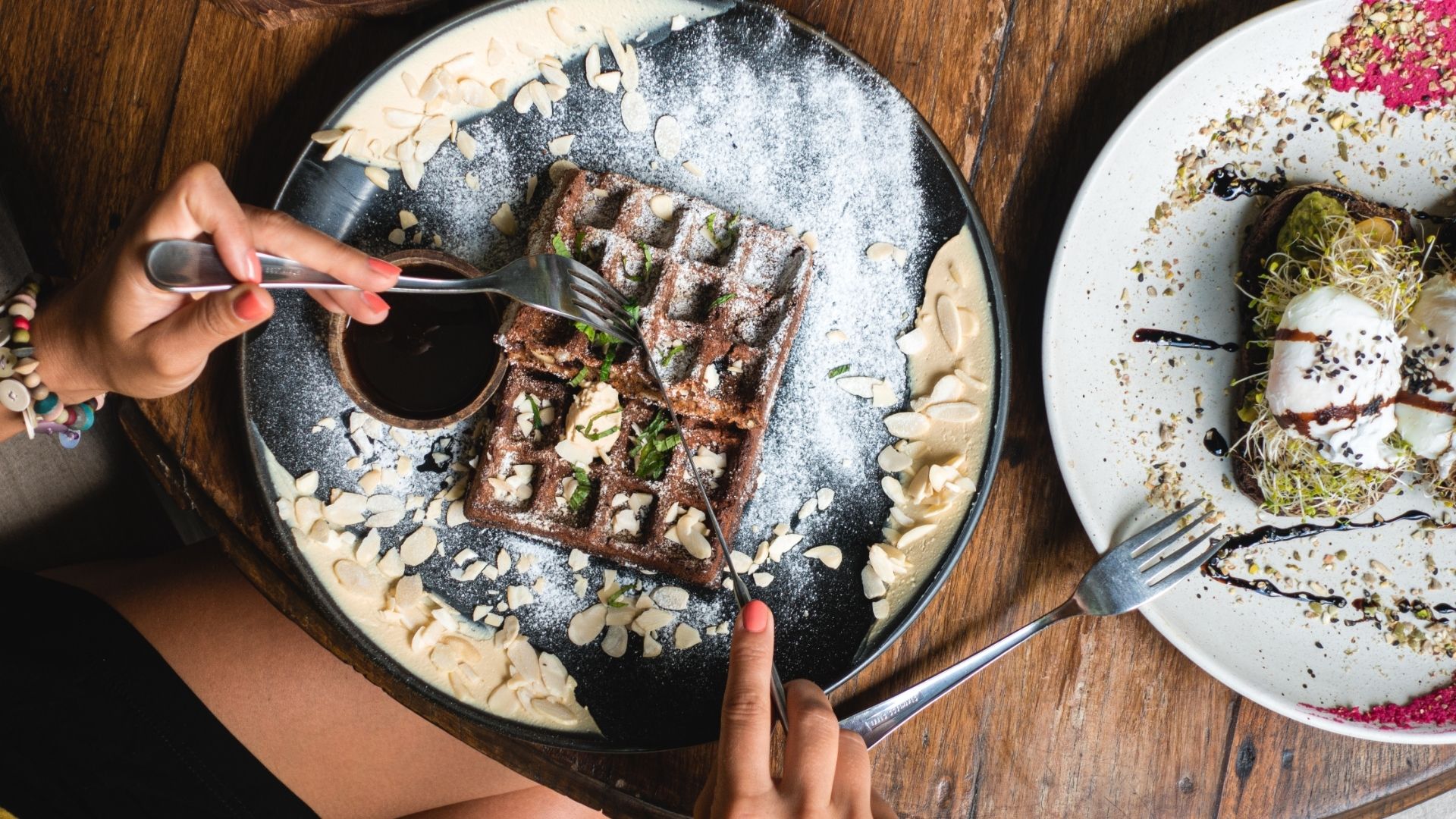 Perfect chocolate waffles with almonds for breakfast