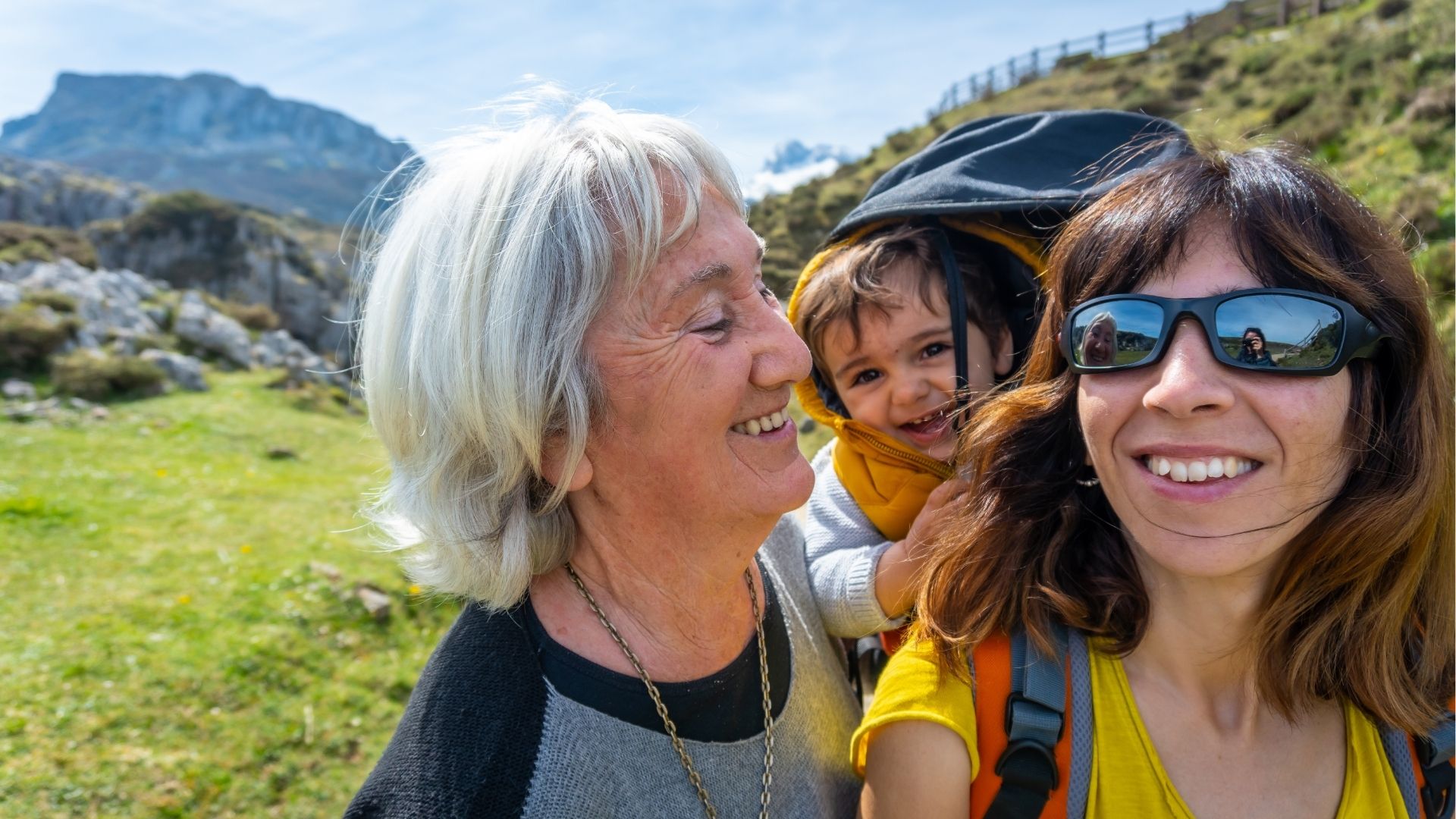 Three generations on the path towards the lakes of Covadonga. Asturias. Spain

