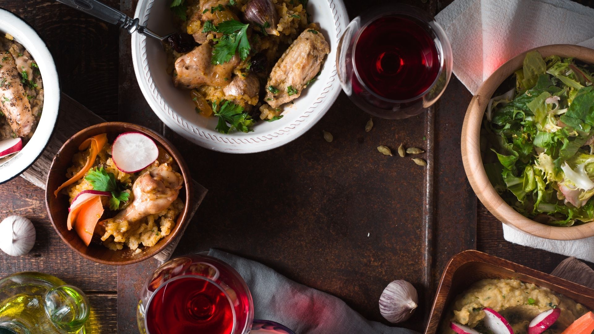 Pilaf, Salad and drink on festive table