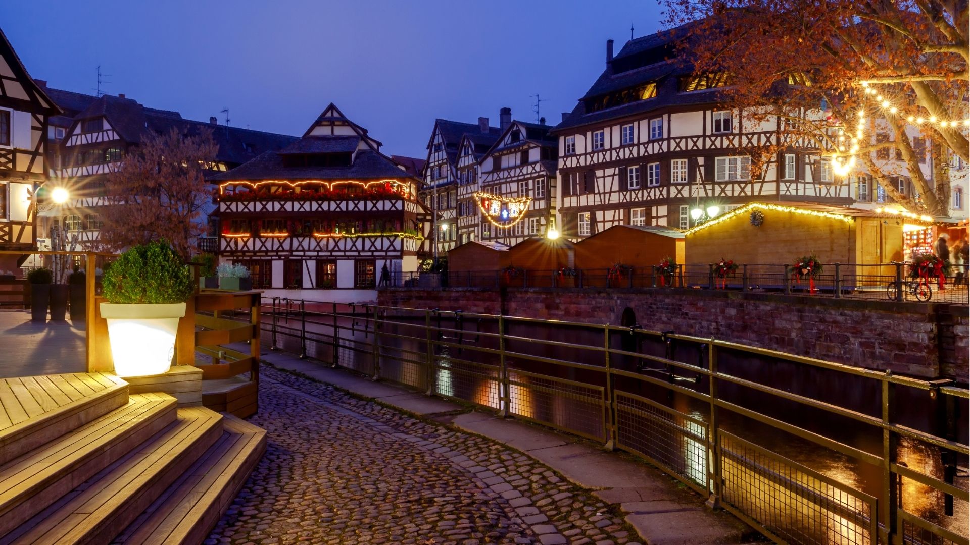 Half-Timbered House On The Canal At Night In Strasbourg