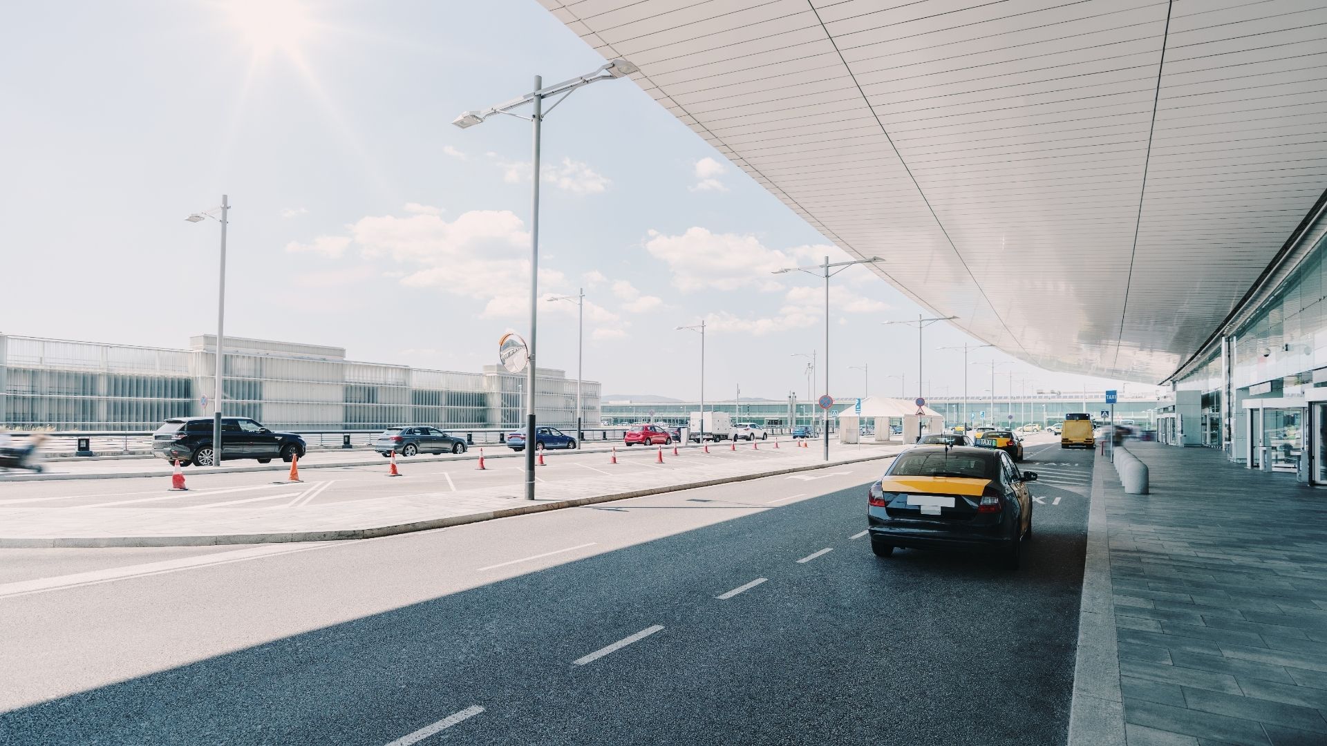 Taxi car near the airport entrance
