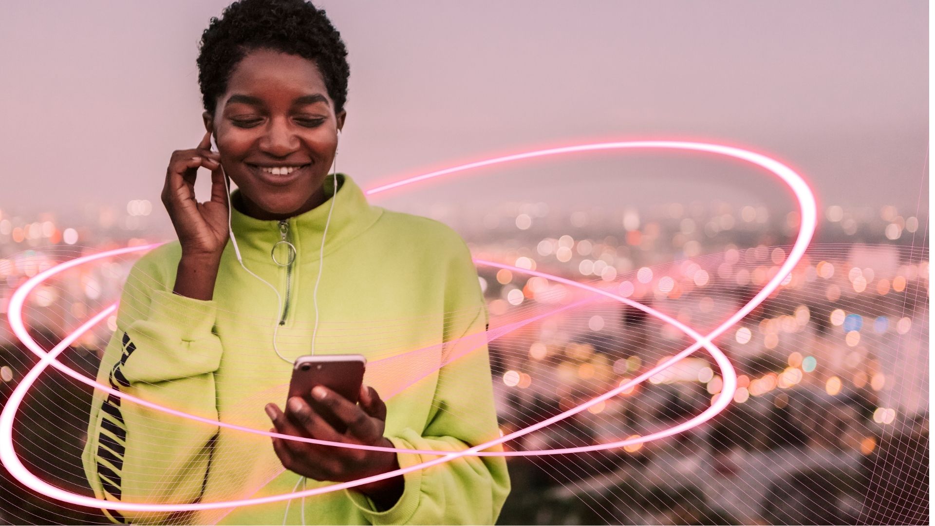 Woman looking at her phone, enjoying fast eSIM connectivity