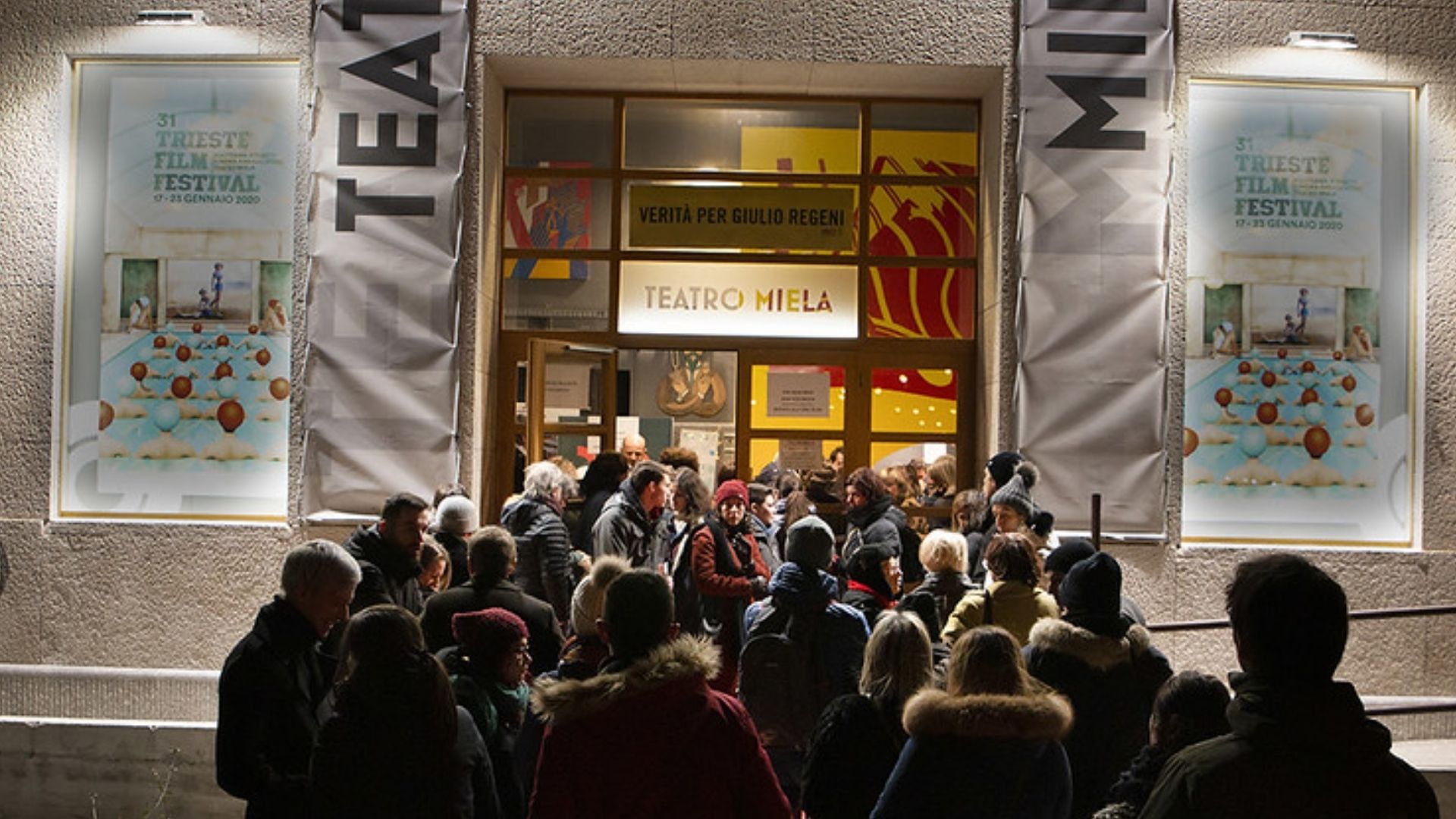Historic theatre at Trieste Film Festival showing a film in January 2026