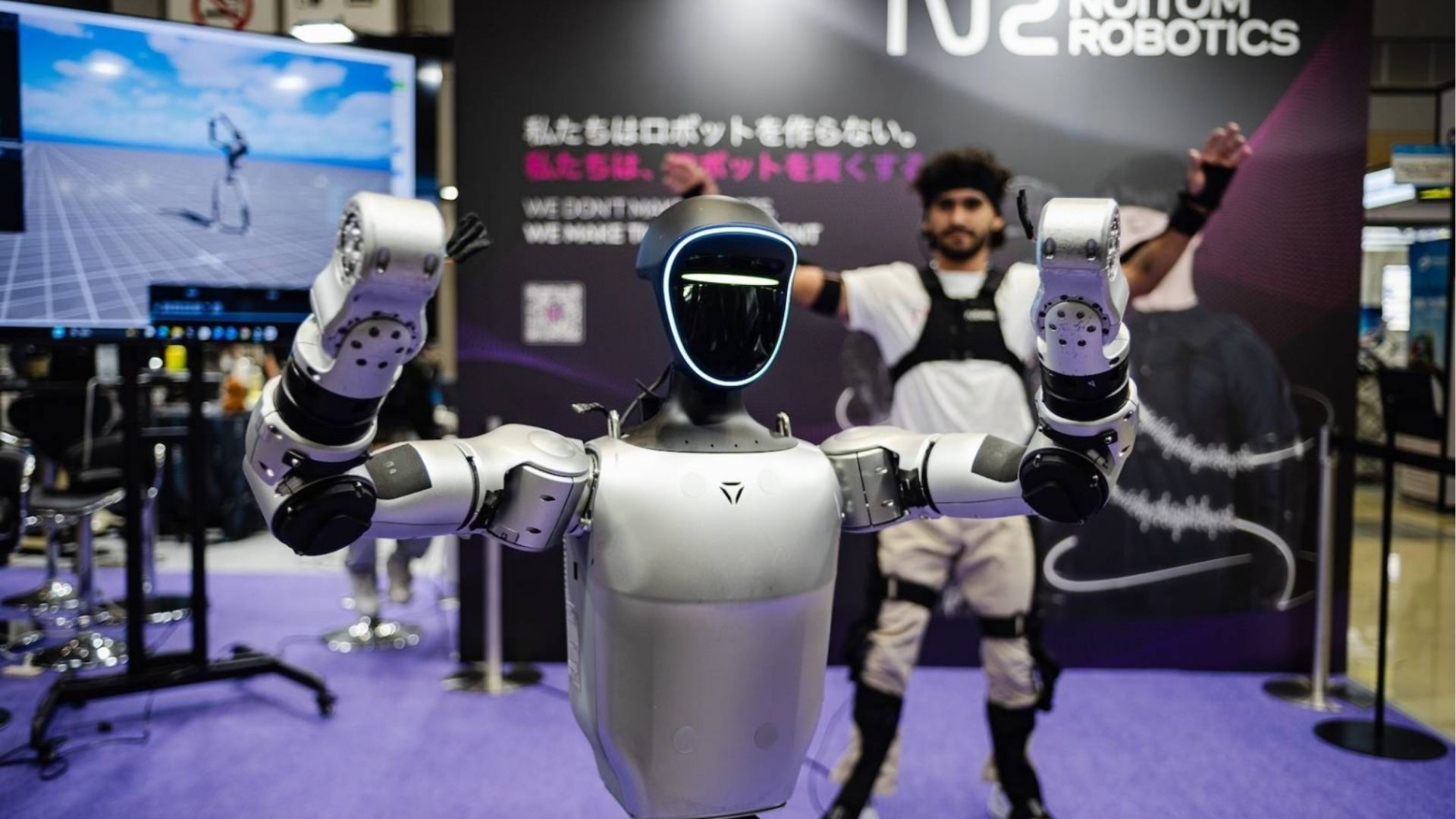 Humanoid robot demonstration at a technology exhibition in Japan convention center