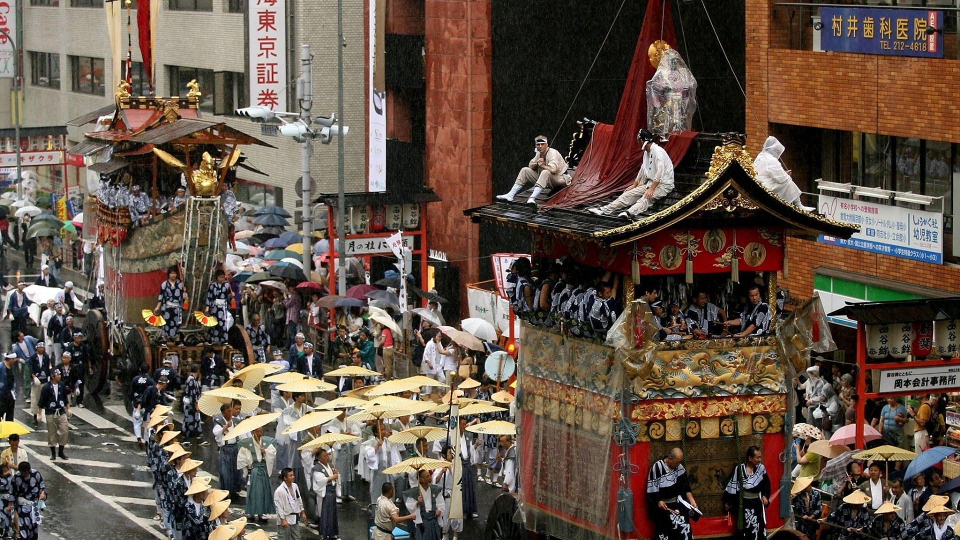 Traditional Kyoto festival parade with decorated floats and participants in historic clothing