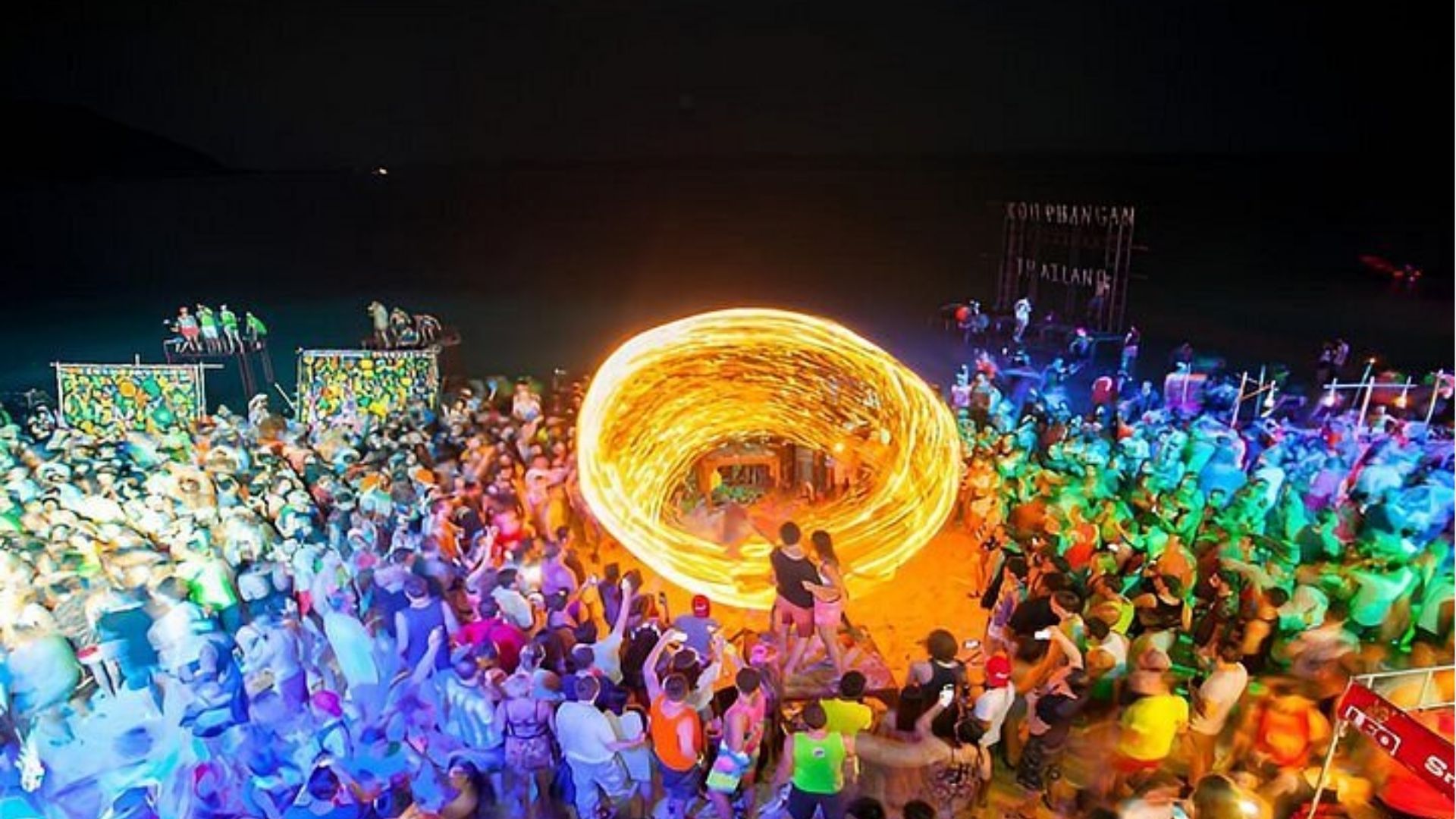 Fire show performance at Full Moon Party Haad Rin Beach Koh Phangan Thailand