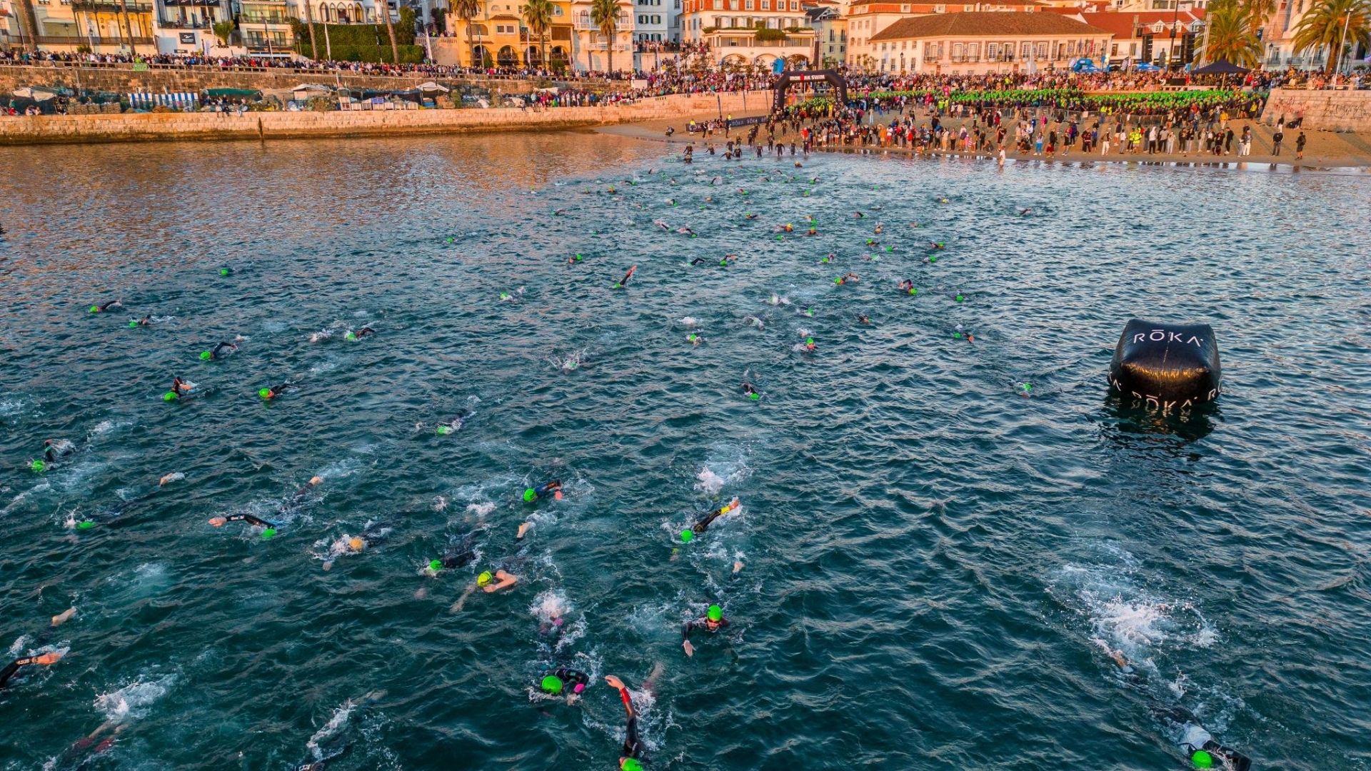 Open water swimming race during a coastal sports event in Portugal