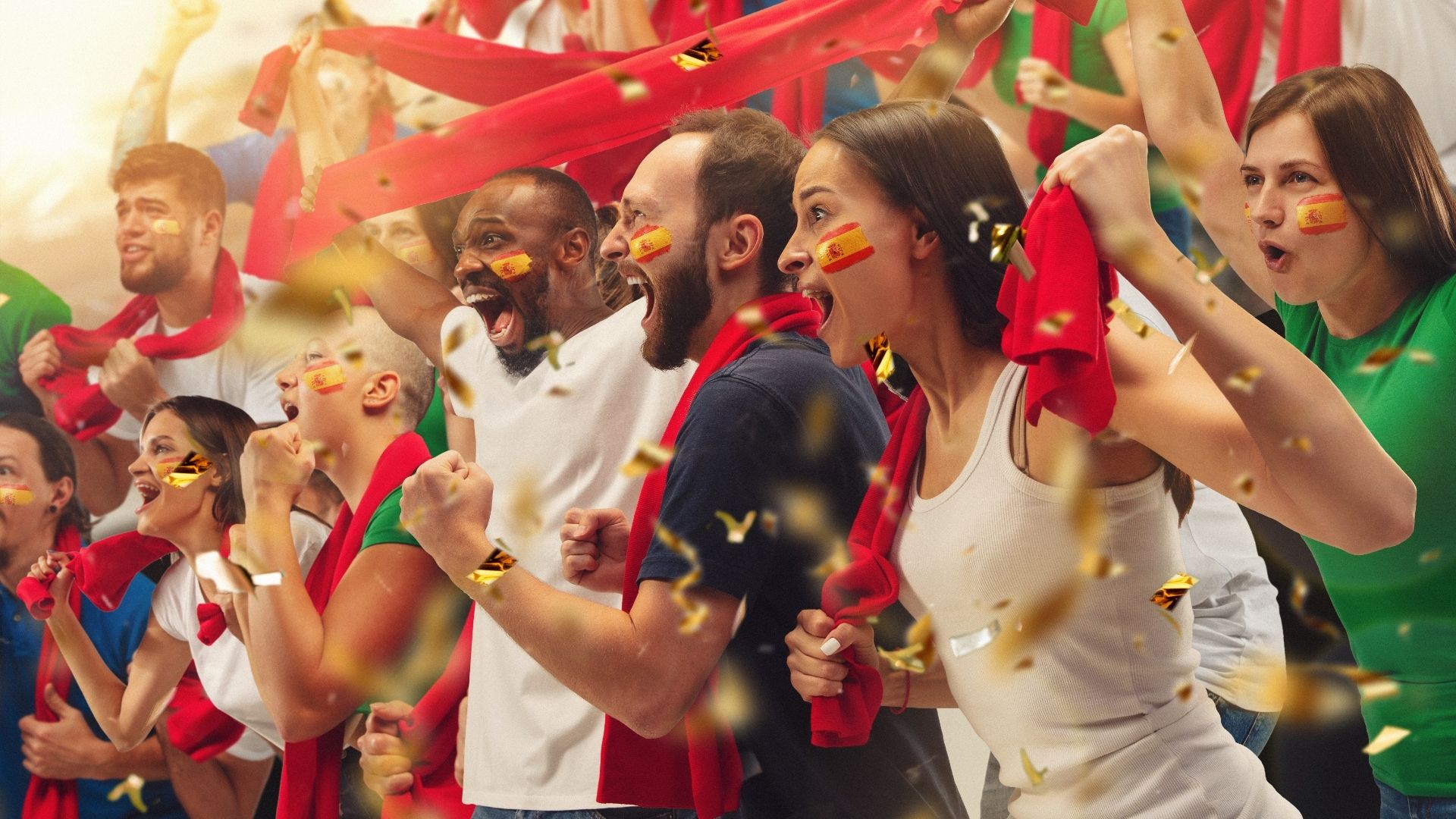 Excited Crowd Celebrating with Painted Faces and Scarves
