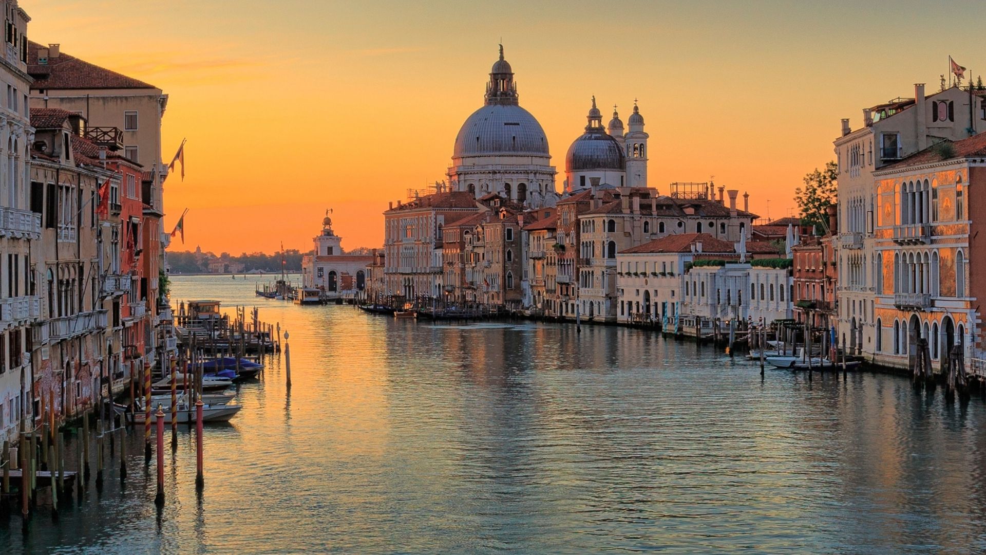 Scenic view of the Canal Grande in the town of Venice, Italy during sunset
