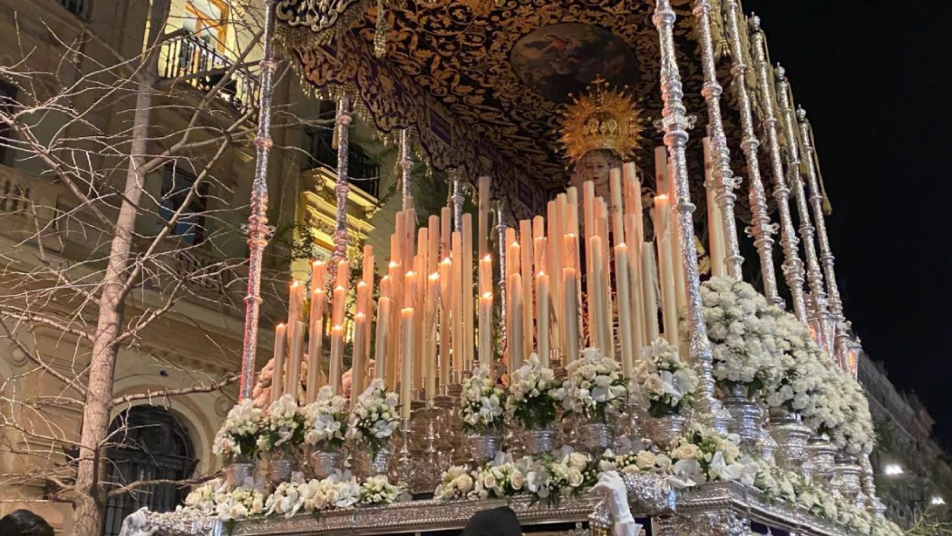 Candlelit Semana Santa float at night
