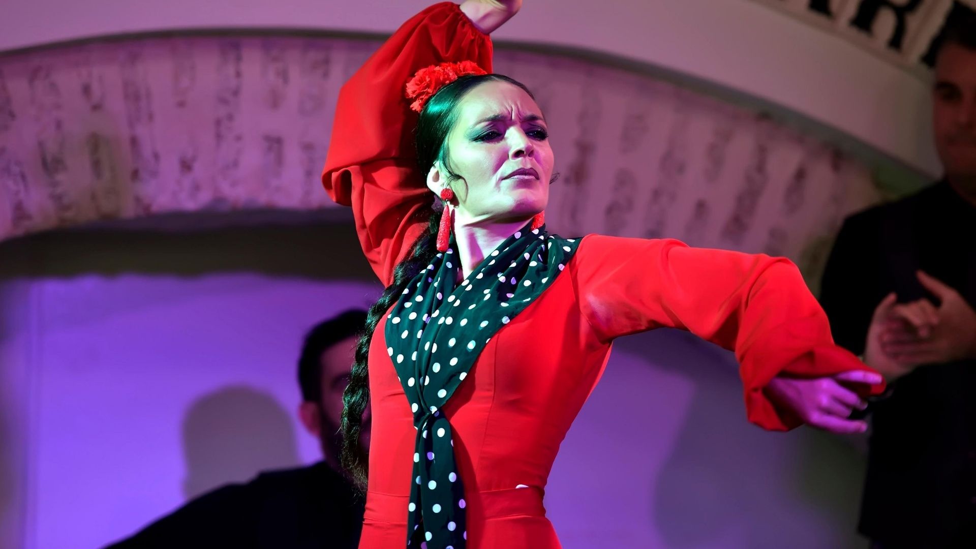 Flamenco dancer performing on stage during Feria de Abril celebration in Seville Spain