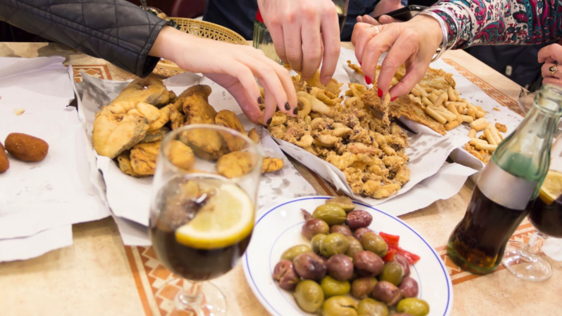 Traditional Spanish tapas and fried seafood served during Feria de Abril festival in Seville
